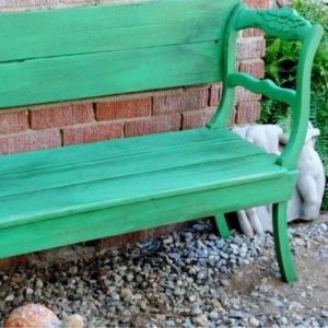 green painted bench made from two wood dining chairs