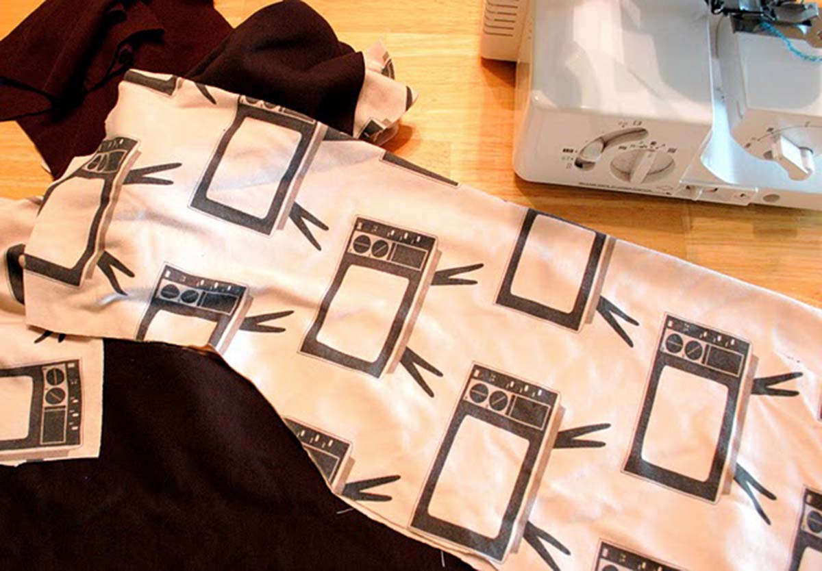 Cut pieces of fabric for hoodie.