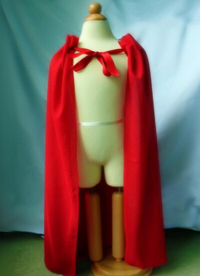 Red no sew DIY cape on a mannequin.