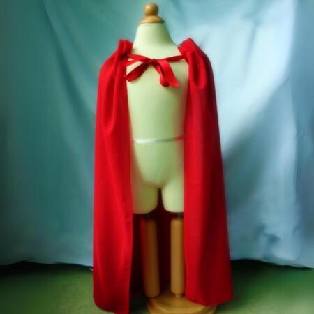 Red no sew DIY cape on a mannequin.