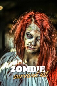Red headed zombie girl with text that says "zombie survival kit".