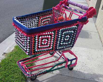 yarn bombed shopping cart