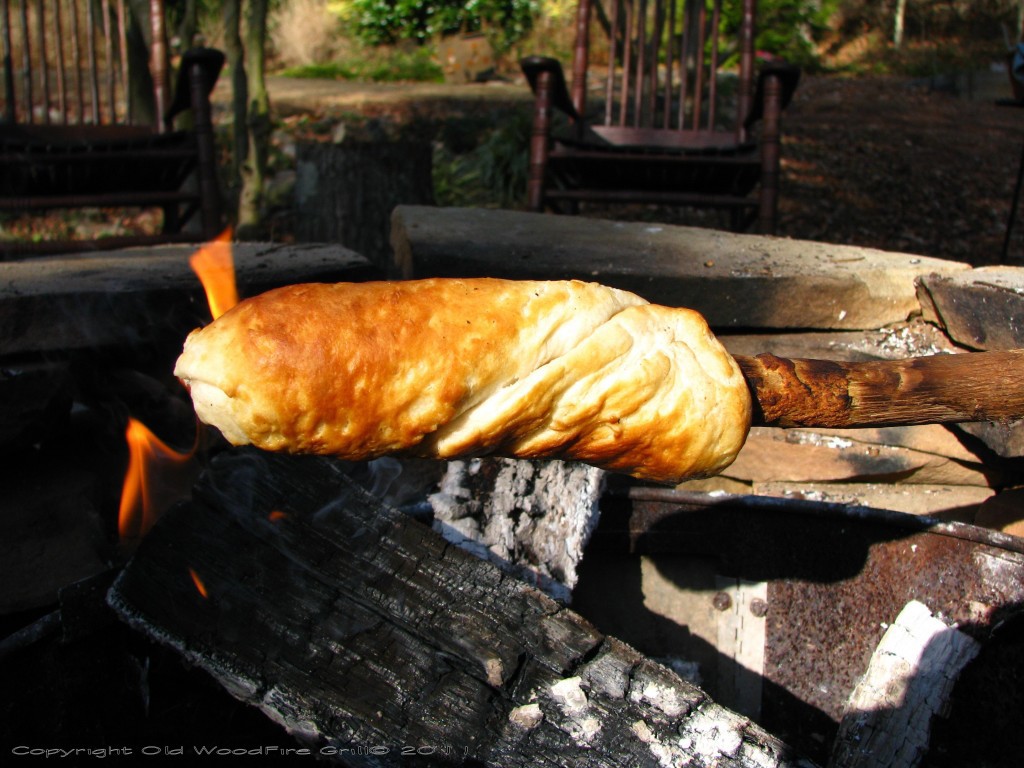 Wrap a canned biscuit on a stick and bake over a campfire. Stuff with scrambled eggs for a delicious breakfast!