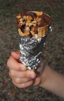 Fill waffle cones with your favorite dessert treats, wrap in foil, and heat over a campfire for gooey goodness!