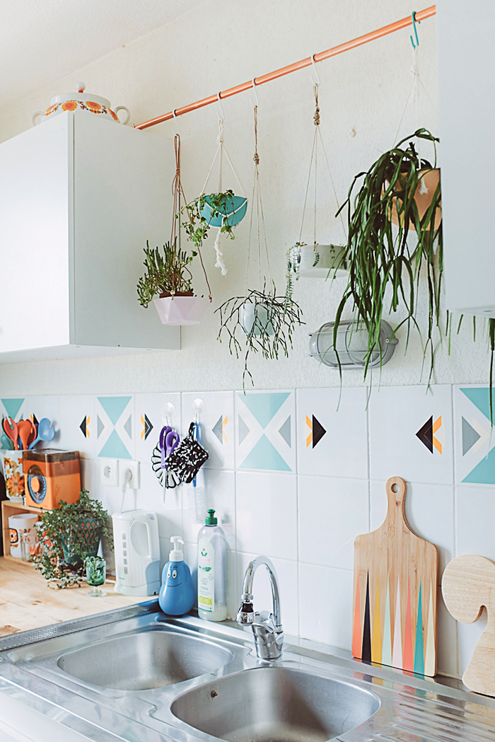 hang a copper rod in the kitchen