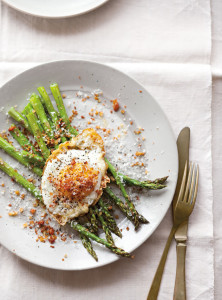Fried egg and pancetta over asparagus