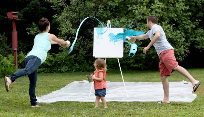 An artistic way to reveal gender with paint and a canvas!