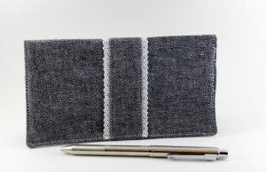 Checkbook cover in black chambray with lace trim