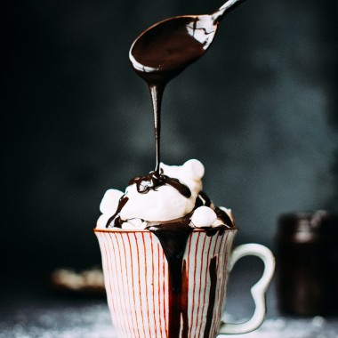mug christmas whipped cream chocolate sauce dripping spoon