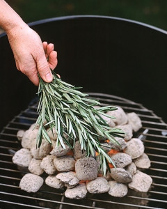 Put herbs on the coals to flavor meat without a marinade