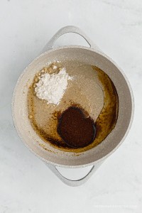Oil, flour, chili powder in a pot.
