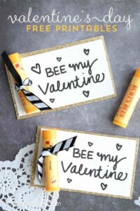 Printed "bee my valentine" card with Burt's Bees chapstick tied to the card.