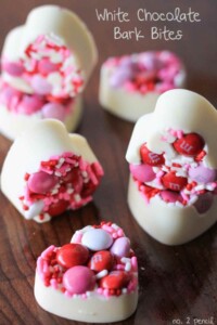 White chocolate little hearts topped with sprinkles.