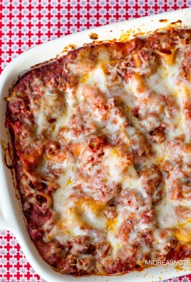 Cheesy lasagna in a pan.