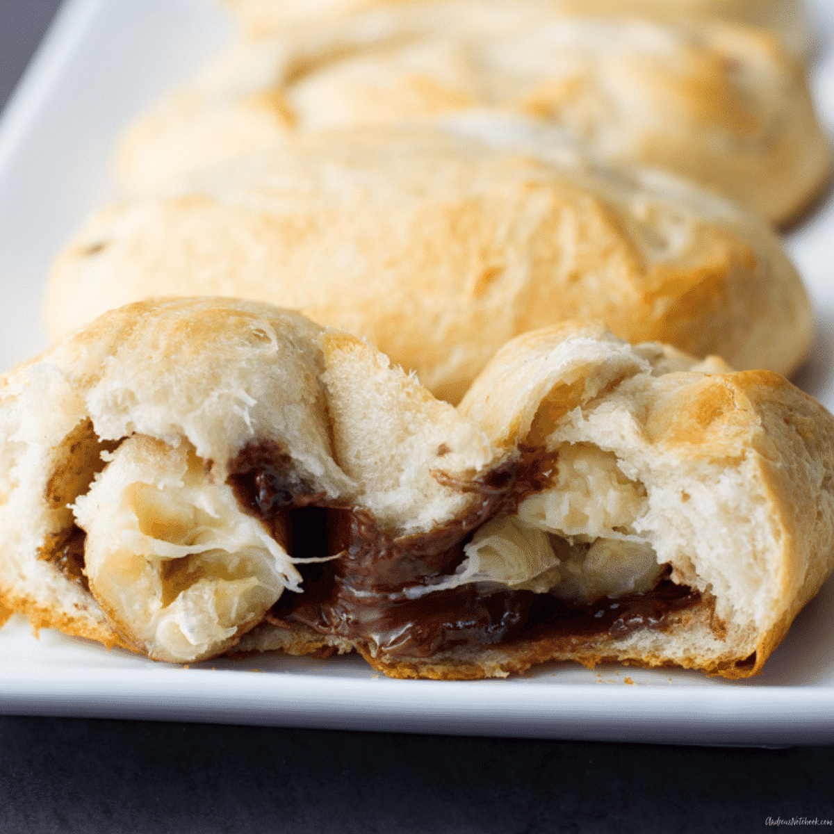 opened banana nutella filled croissant