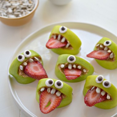 Silly apple and strawberry monster face halloween treats.