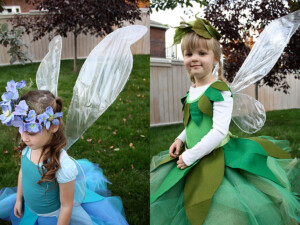 A blue and a green fairy: two girls with fairy costumes and DIY no sew iridescent fairy wings.