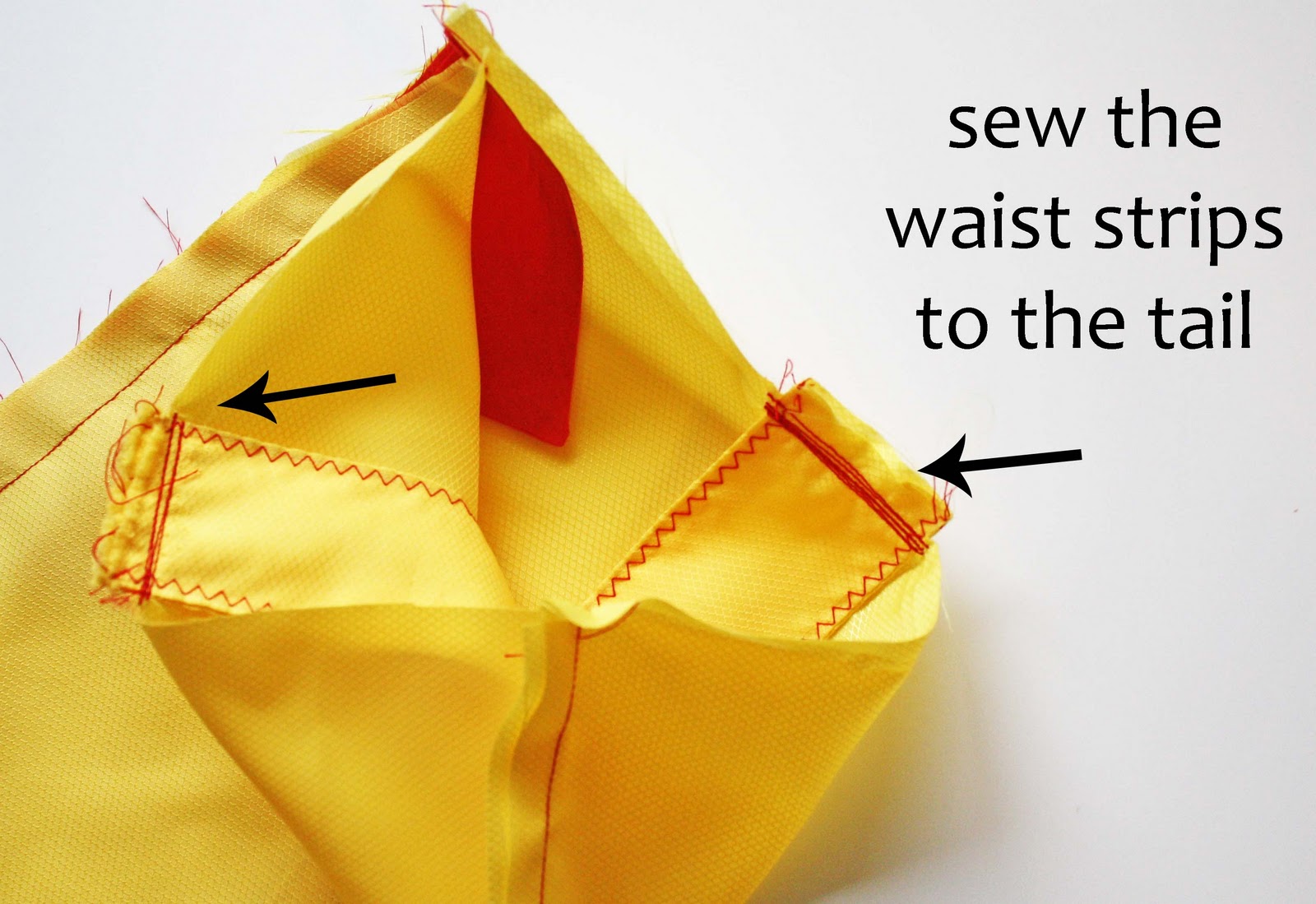 sew the waist straps to the tail.