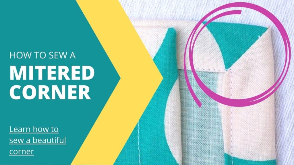 mitered corner of a turquoise and white napkin - text: how to sew a mitered corner