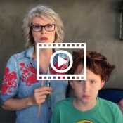 woman looks shocked at her terrible haircut on her son