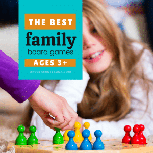 kids playing a board game and white die | text says ages 3+ the best family board games