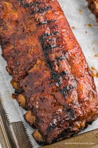 Baby back ribs with grill lines on them.