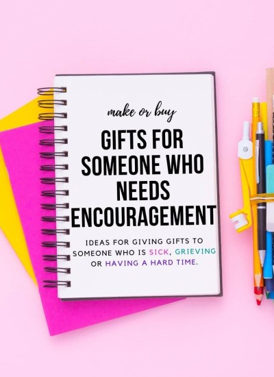 pink background, empty notebook. Text: gifts for someone who needs encouragement