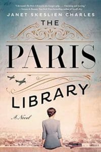 book cover: The Paris Library by Janet Skelslien Charles - image of a woman sitting on a concrete wall looking at the eifel tower