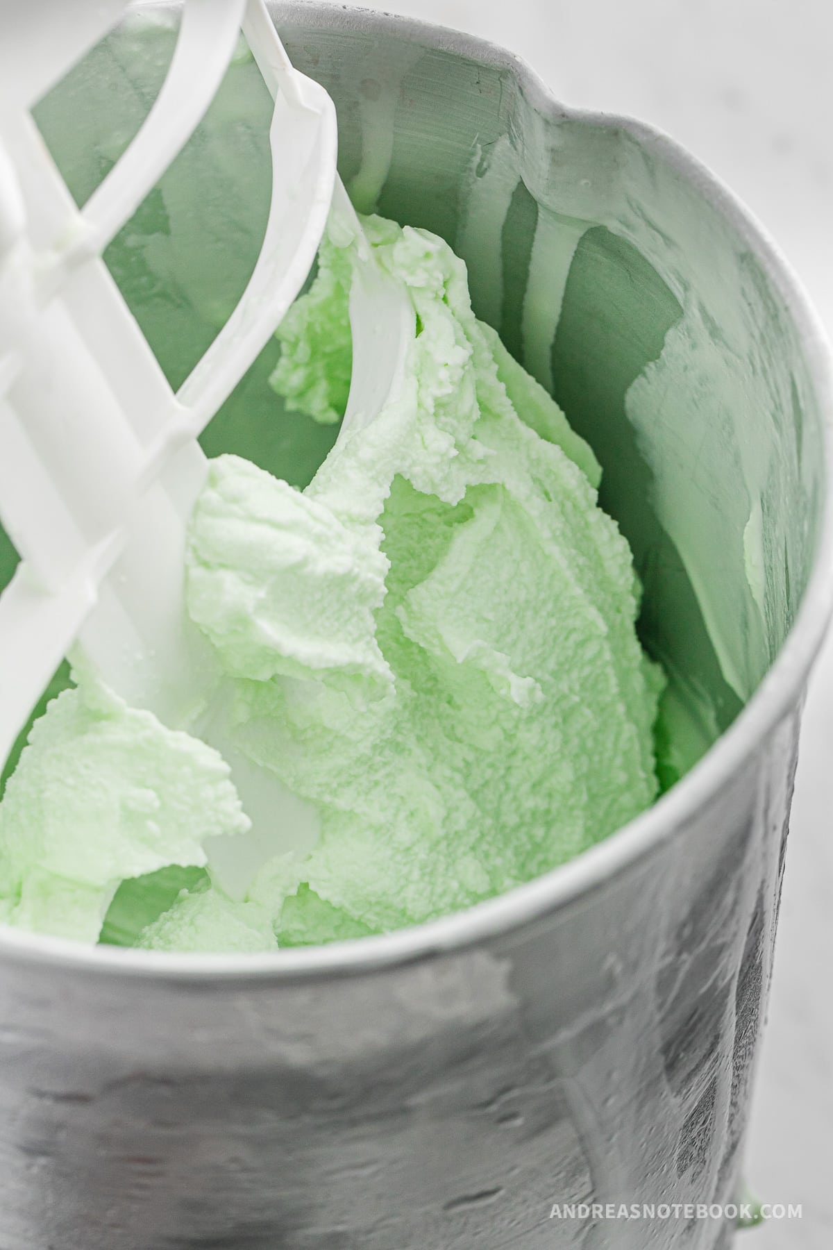 Mint ice cream in an ice cream maker.