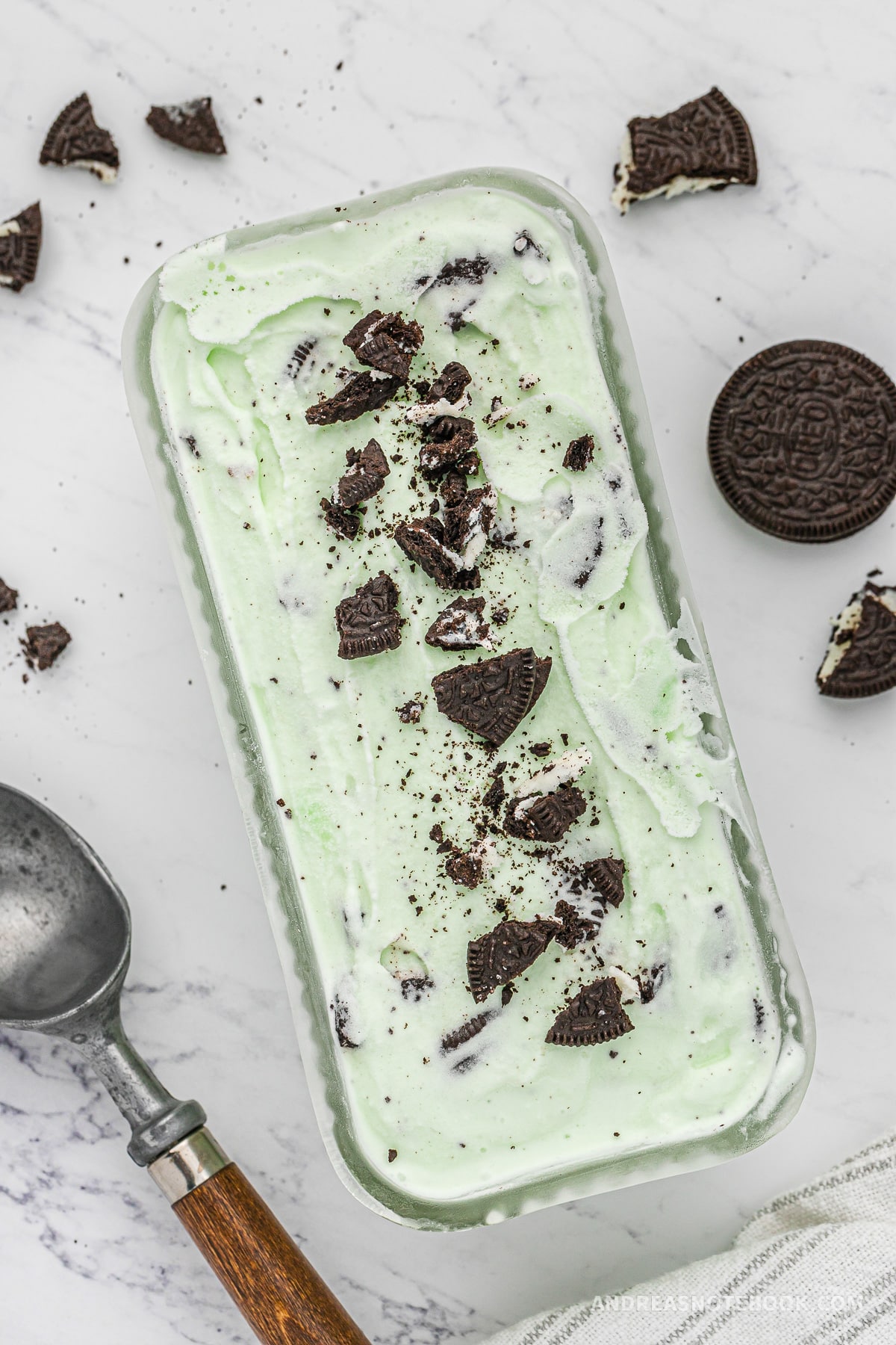 Mint oreo cookie ice cream in a bread pan.