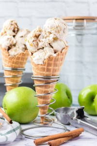 two ice cream cones with apple pie ice cream in them.