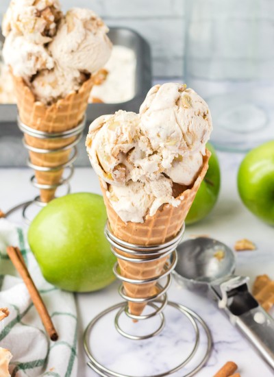 Apple pie ice cream cones in an ice cream holder.