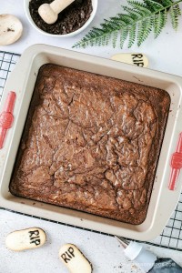 Cooked brownies in a pan.