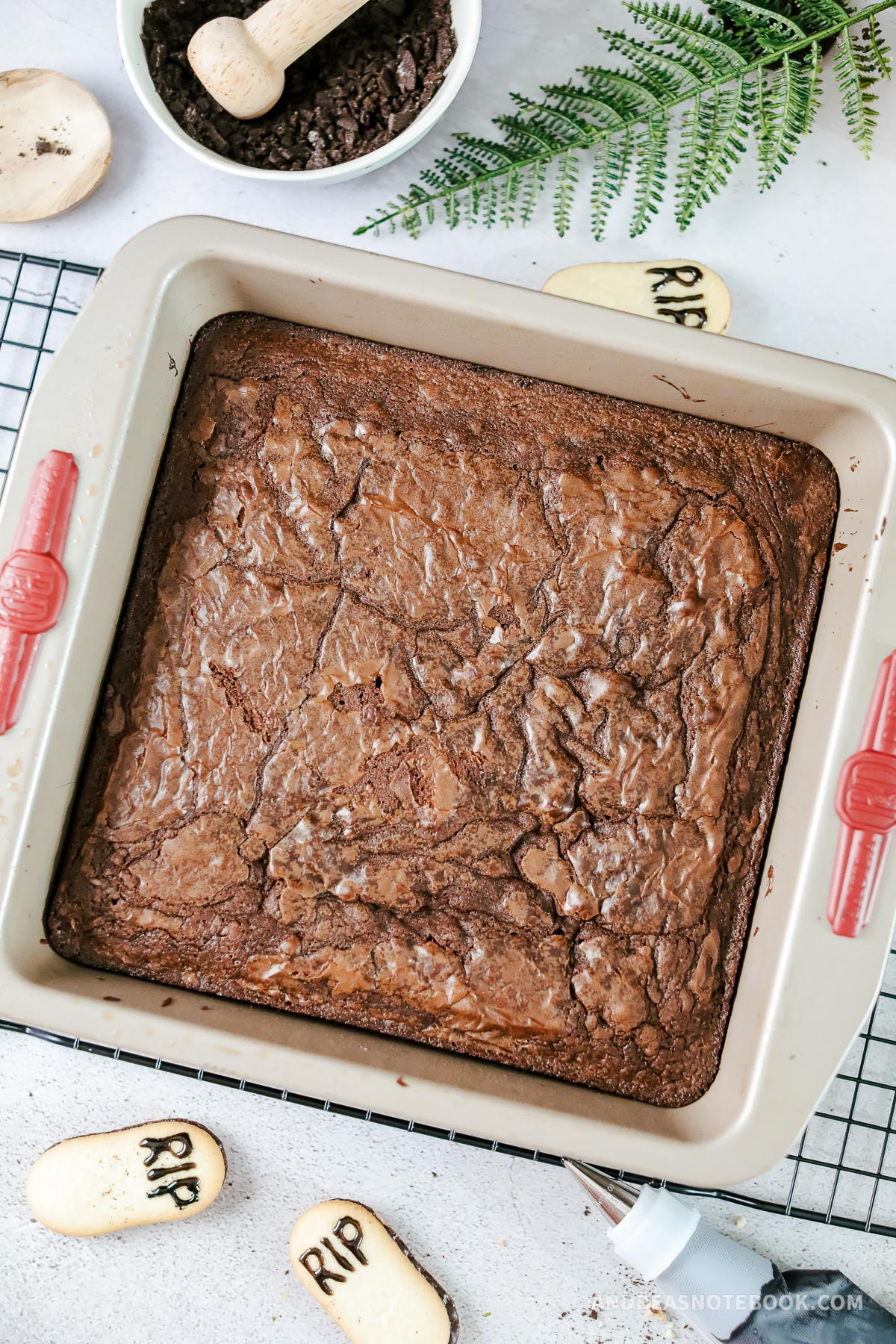 Cooked brownies in a pan.