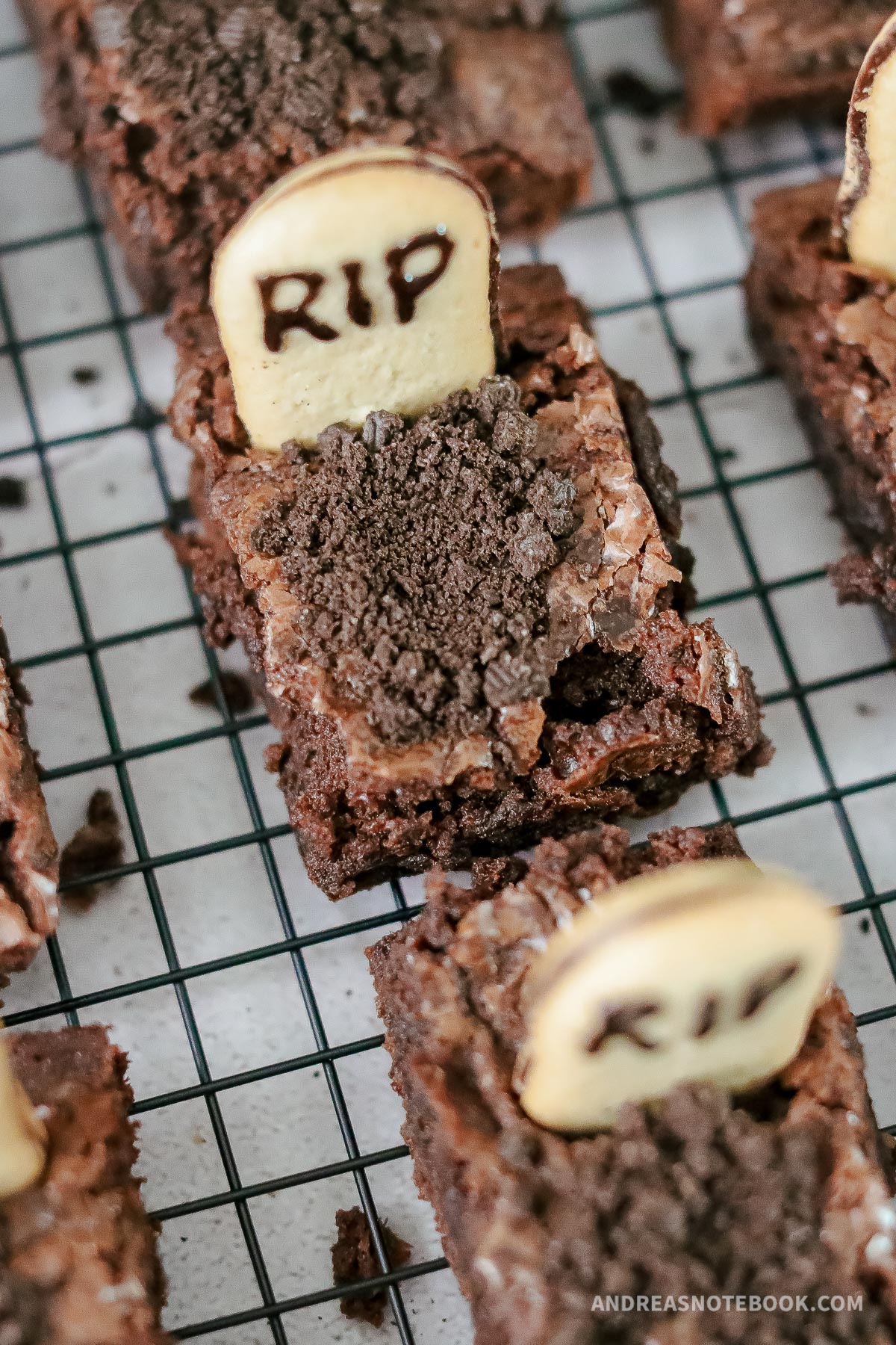 Brownies with "dirt" on top and a headstone.