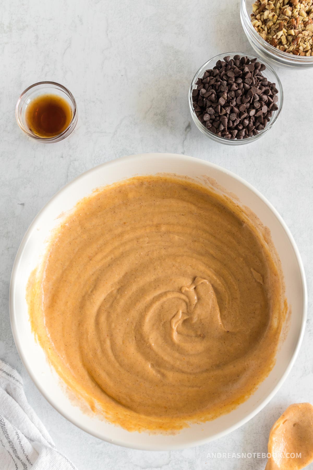 Pumpkin pecan pancake batter in a bowl without pecans or chocolate chips.