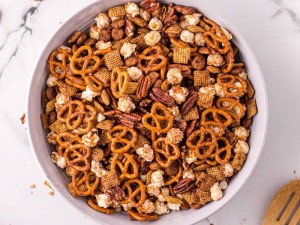 Chex mix with nuts and white chocolate and toffee bits added in.
