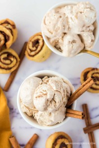 Cinnamon roll ice cream scoops in a bowl.