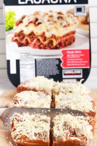 Frozen Costco lasagna cut into pieces.