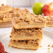 Stack of apple pie squares.