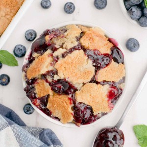 Blueberry dump cake in a bowl.