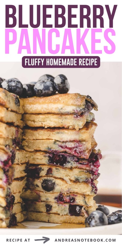 Blueberry pancakes in a stack, cut open to show the insides.