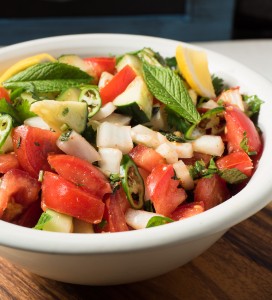 cucumber and tomato salad in bowl.