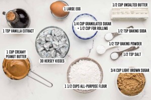 Labeled image of peanut butter blossoms cookie recipe ingredients in bowls and measuring cups.