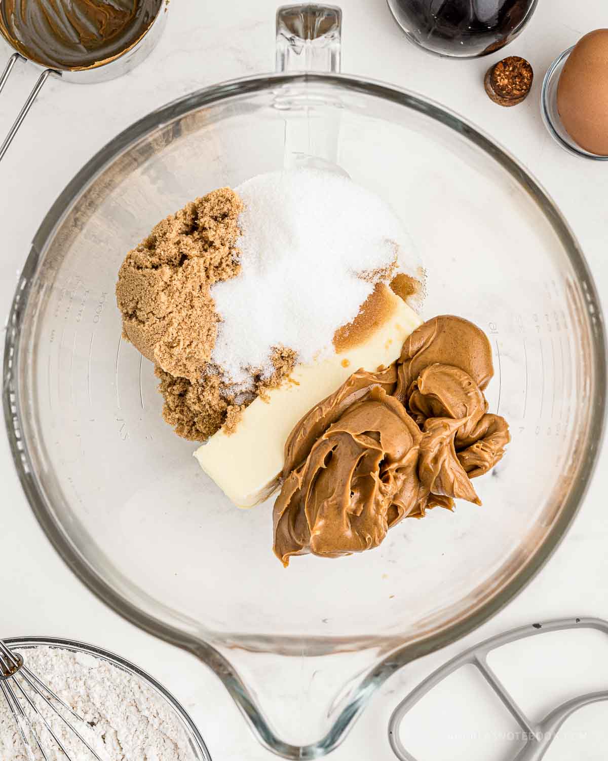 Bowl of wet ingredients for peanut butter cookies.