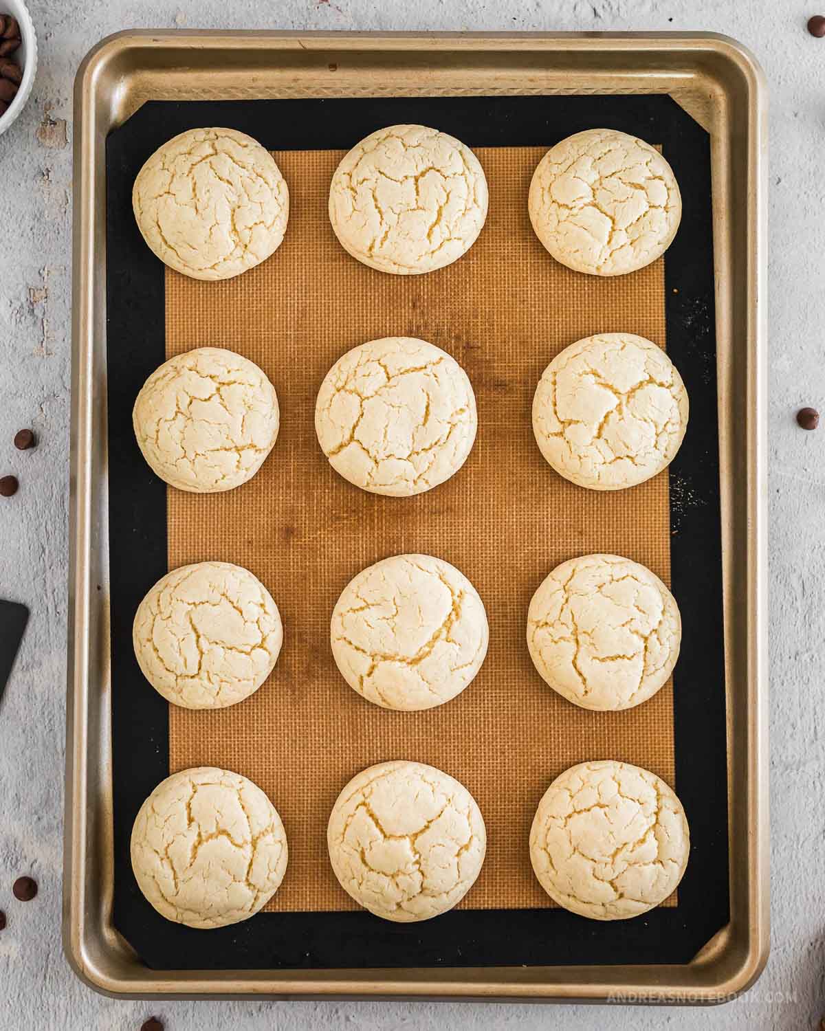 Cooked 4 ingredient cake mix cookies on a baking sheet.