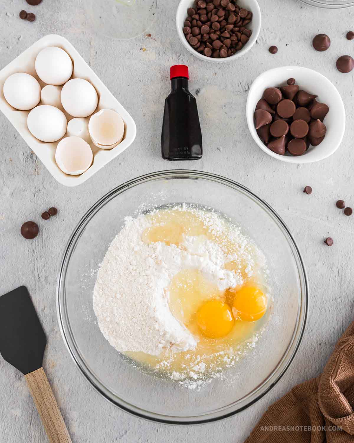 Large bowl with cake mix, oil, vanilla and eggs in it.