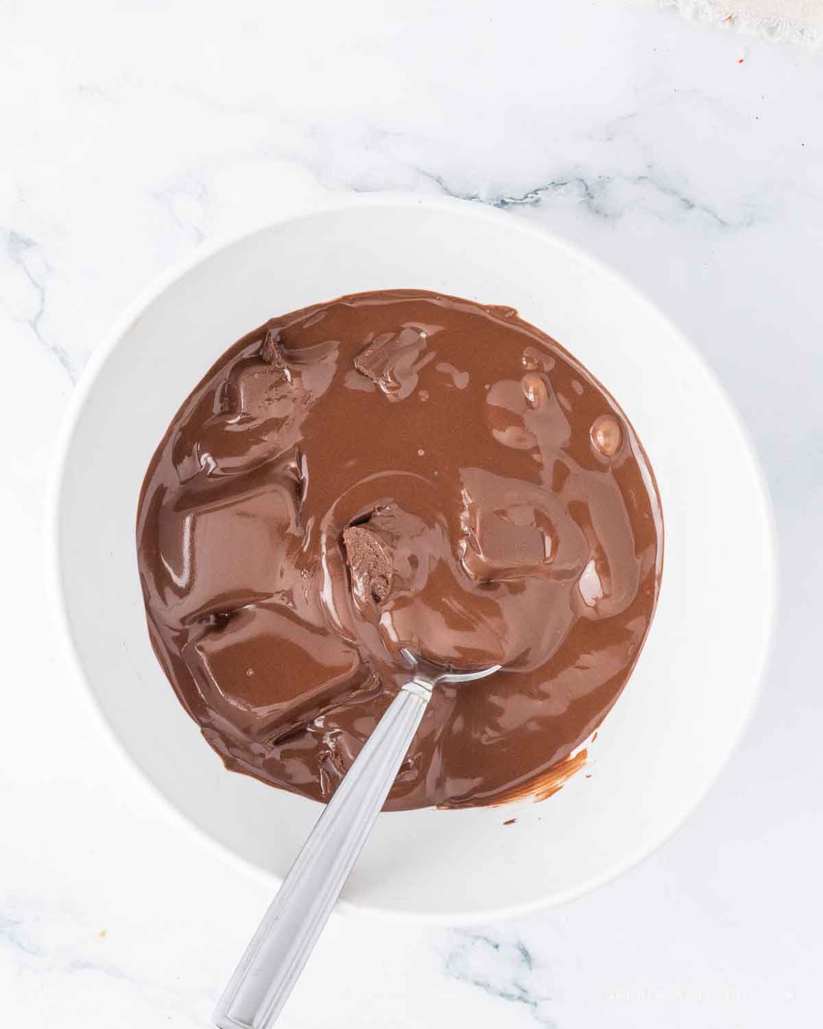 Softened melting chocolate in a bowl.