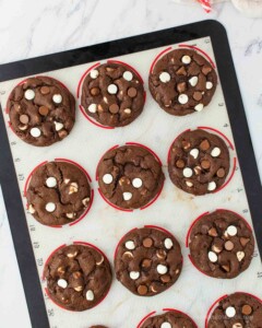 Baked double chocolate peppermint cookies on a baking sheet.