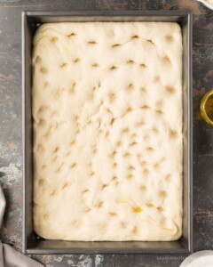 Focaccia bread with finger punch prints in it.